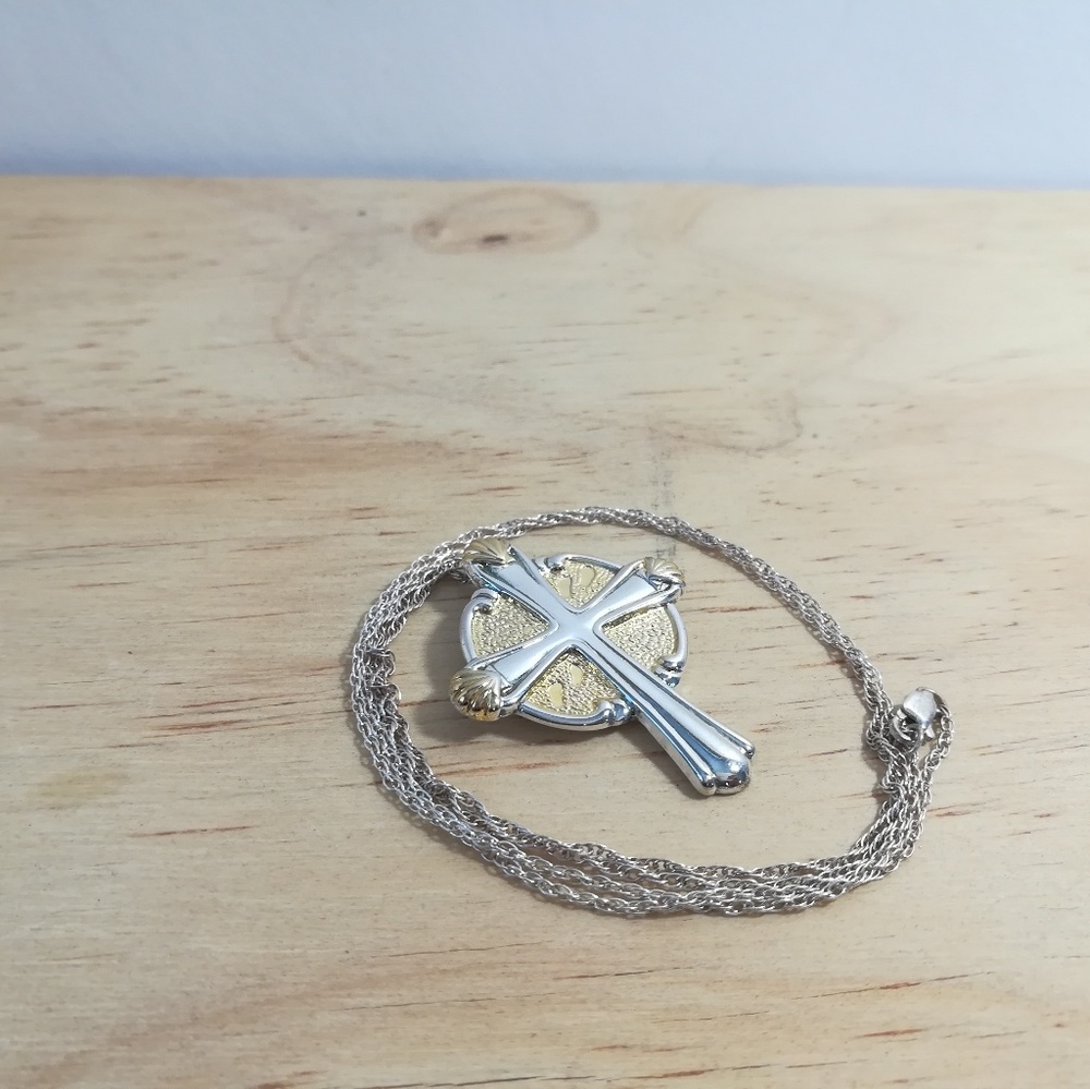 Gorham Sterling cross with 24 in chain.